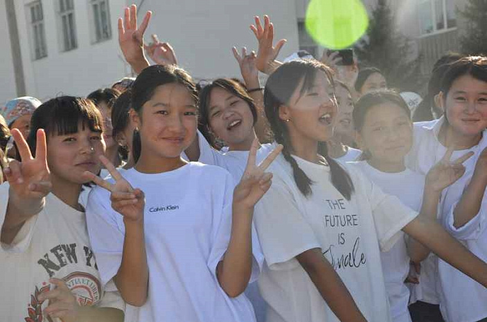 School, in front of your name...