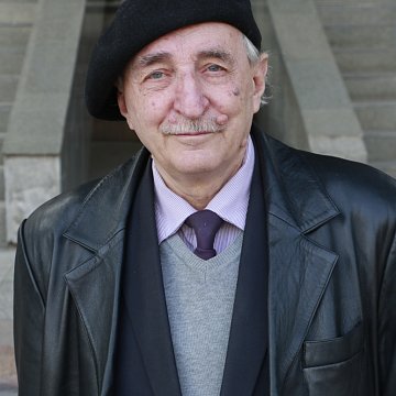 Dean by vocation, poet and musician at heart
