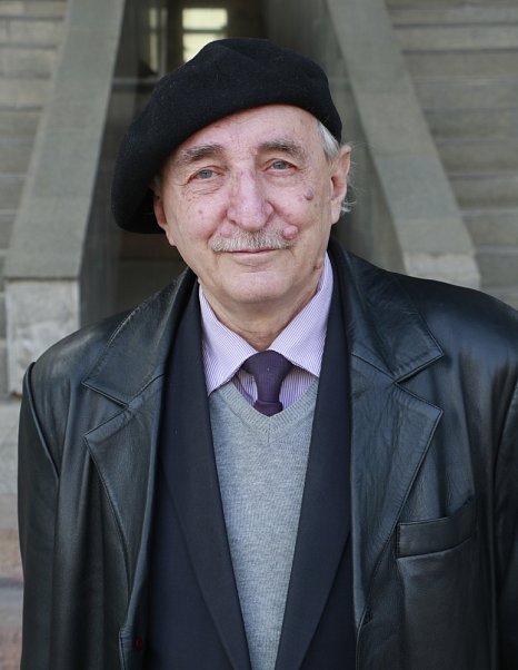 Dean by vocation, poet and musician at heart